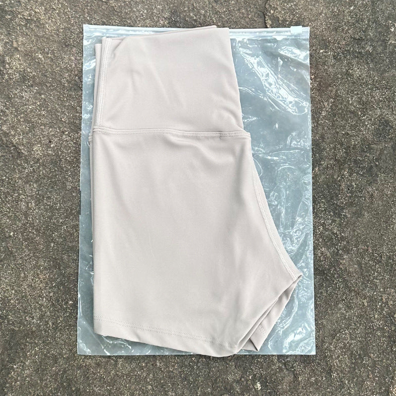 New Nude High-Waist Brushed Shorts Yoga Wear Nylon Shorts Women's Tight Yoga Three-Point Sports Shorts Peach