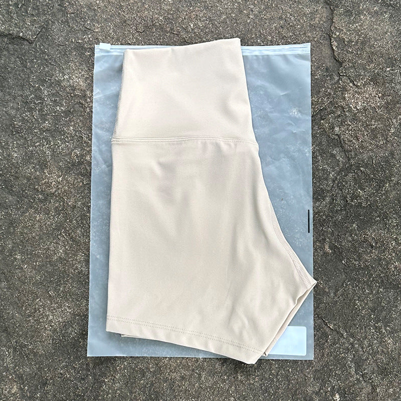 New Nude High-Waist Brushed Shorts Yoga Wear Nylon Shorts Women's Tight Yoga Three-Point Sports Shorts Peach
