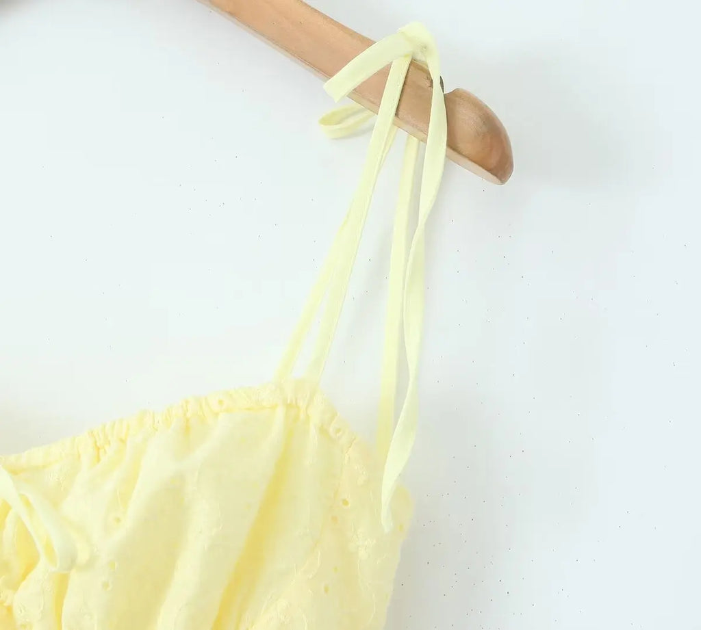 YENKYE Sexy Elegant Women Hollow Out Embroidery Yellow Sling Mini Dress Low Waist Lace Up Bandage Party Dresses Birthday Robe