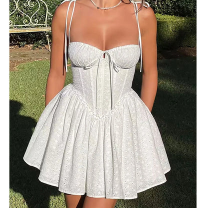 YENKYE Sexy Elegant Women Hollow Out Embroidery Yellow Sling Mini Dress Low Waist Lace Up Bandage Party Dresses Birthday Robe