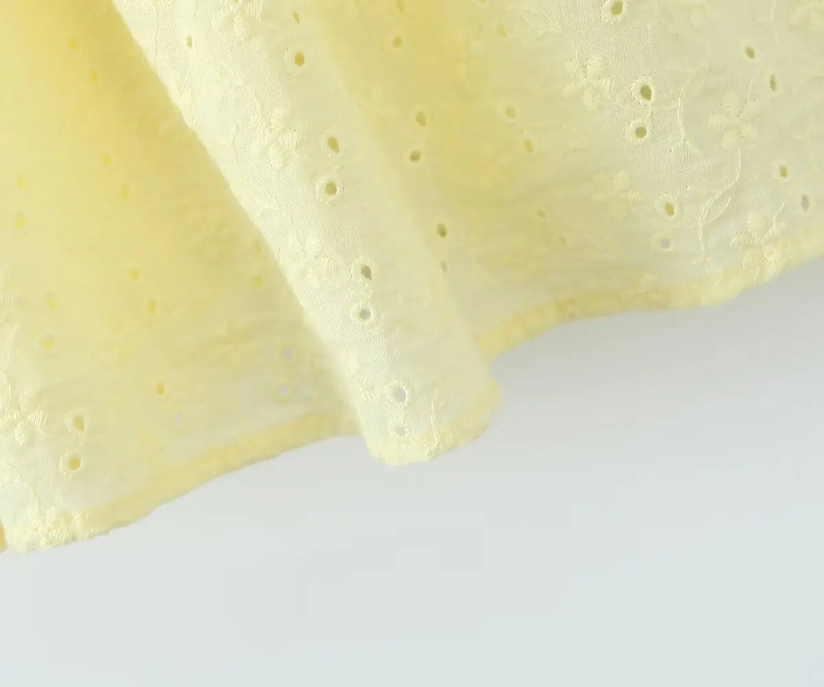 YENKYE Sexy Elegant Women Hollow Out Embroidery Yellow Sling Mini Dress Low Waist Lace Up Bandage Party Dresses Birthday Robe